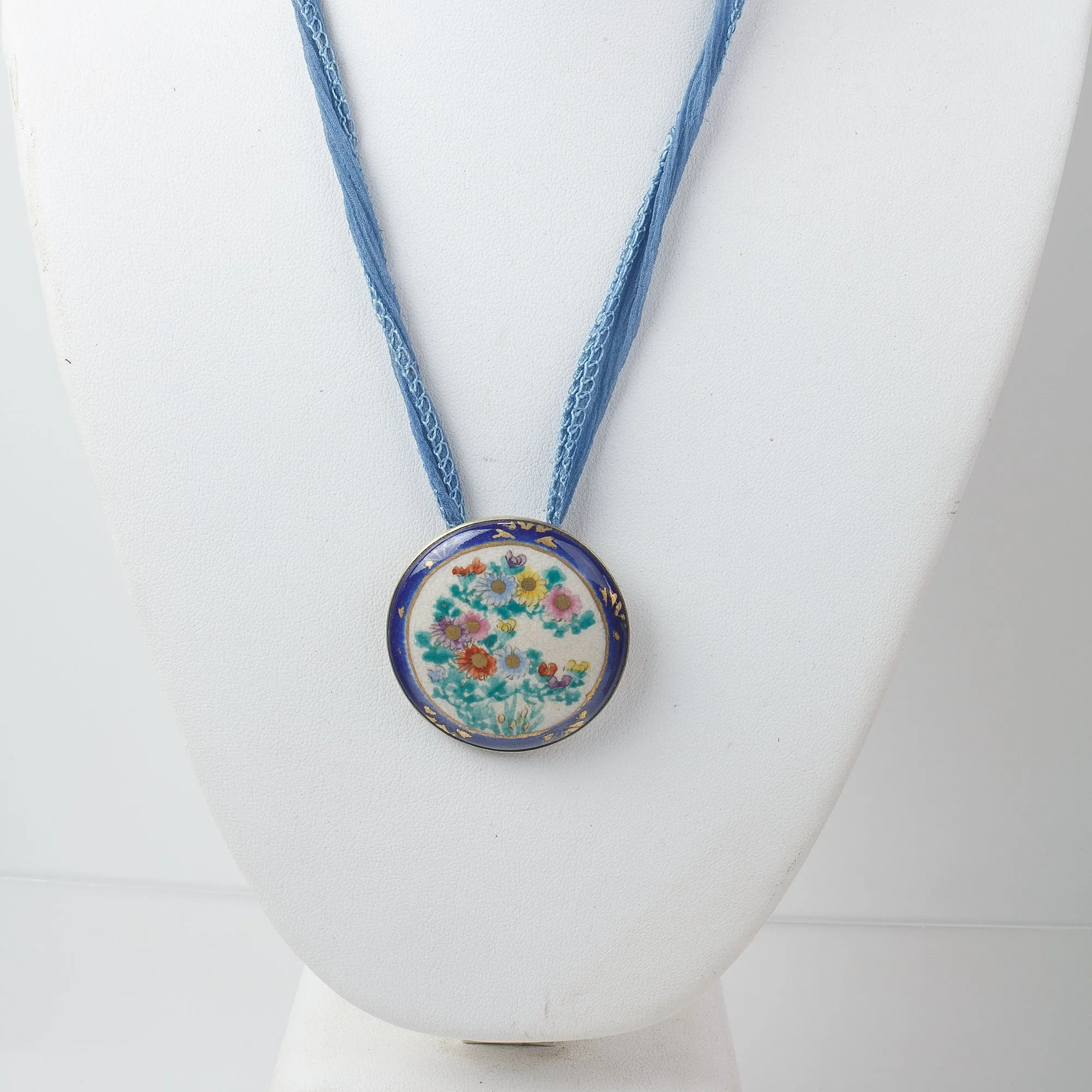 Antique Japanese Satsuma silver pendant with silk ribbon. Pdor428
