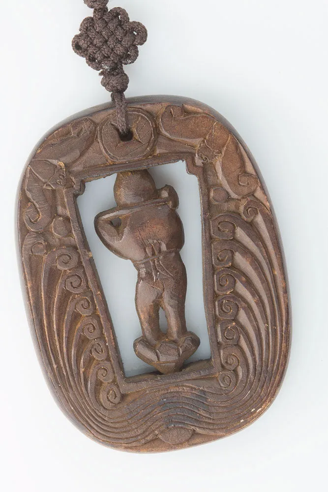 Vintage Chinese carved wood swiveling deity with two bats descending from heaven pendant. pdwd101